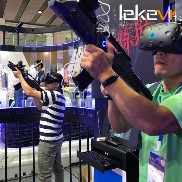 Virtual shooting experience with VR guns at tech exhibition. People enjoying a virtual reality shooting game using VR headsets and guns in a high-tech arcade setting.
