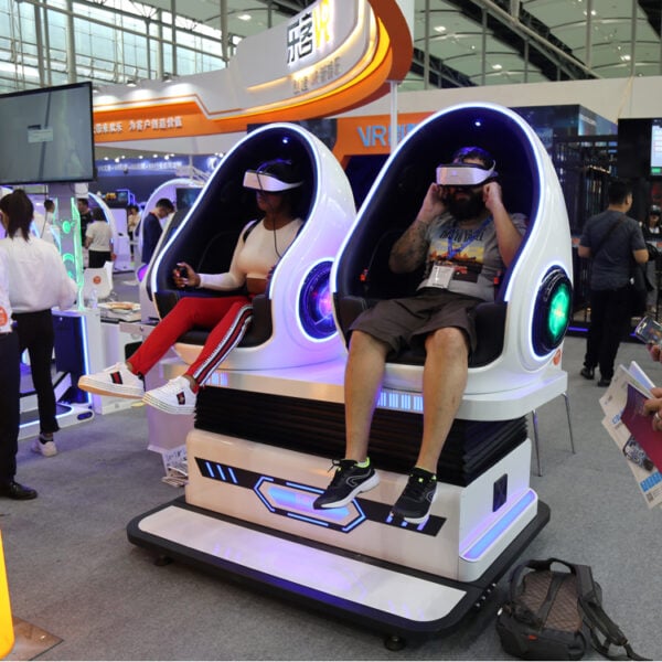 Immersive VR gaming chairs with built-in headsets for a realistic virtual experience, featuring modern design and comfort, showcased at technology expo.