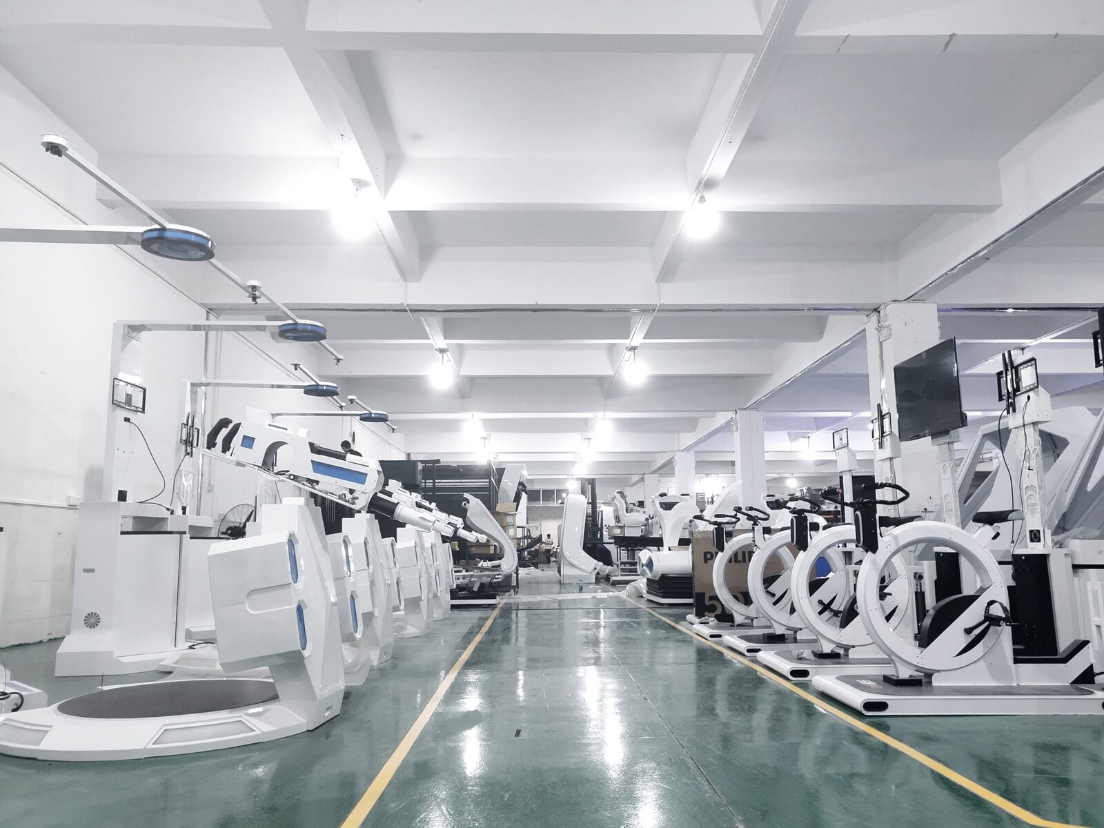 Robotics and automation machinery in a modern manufacturing plant, showcasing advanced technology for industrial production.