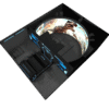 A detailed, futuristic gaming console with a large, curved screen displaying a dinosaur scene, featuring sleek black design and blue LED accents.